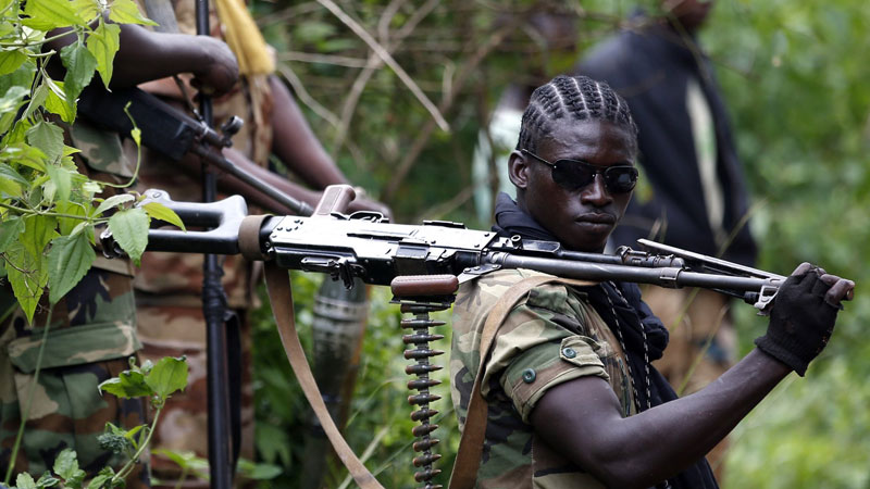 Combattants de la Seleka à Kouango, près de la frontière avec la RDC, le 9 juin 2014. © Reuters/Goran Tomasevic